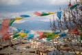 Prayer flags blow in Shangri-La, China. Royalty Free Stock Photo