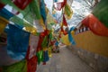 Prayer flags blow in Shangri-La, China. Royalty Free Stock Photo