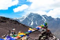 Prayer flags fluttering in the wind on top of a mountain Royalty Free Stock Photo