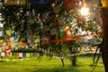 Prayer flags hanging at garden in Lumbini, Nepal Royalty Free Stock Photo