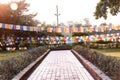 Prayer flags hanging at garden in Lumbini, Nepal Royalty Free Stock Photo