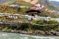 Prayer flags on the iron bridge of Tamchog Lhakhang Monastery, Paro River, Bhutan