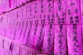 Prayer flags or slips of a pink colour with names in Chinese black ink in the Thien Hau Temple, Cho Lon, Ho Chi Minh Ci, Vietnam Royalty Free Stock Photo
