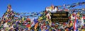 Prayer flags and signboard on the Thorang La mountain pass Royalty Free Stock Photo