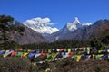 Prayer flags and snow capped mountains Lhotse and Ama Dablam Royalty Free Stock Photo