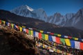 Prayer flags and snow mountain range background from Annapurna Base Camp ,Nepal. Royalty Free Stock Photo