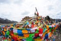 Prayer flags with white tower