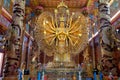 Prayer hall of Chinese Buddhist temple, Wat Metta Dharma Bodhiyan, which features a large standing wooden sculpture of Guan Yin.