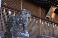 Prayer hall and guardian dog of Ujigami shrine Royalty Free Stock Photo