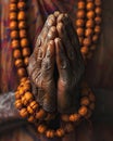 Prayer hands with rosary beads, close-up. The concept of religion and spirituality.