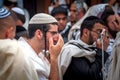 Prayer. Hasidim pilgrims in traditional clothes. Rosh ha Shana festival, Jewish New Year.