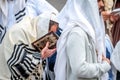 Prayer. Hasids pilgrims in traditional clothes. Rosh-ha-Shana festival, Jewish New Year.