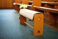 a prayer kneeler resting in an aisle Royalty Free Stock Photo