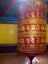 Prayer mill. Very large prayer wheels contain billions of mantras Royalty Free Stock Photo