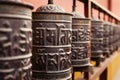 Prayer mills in buddhist monastery Royalty Free Stock Photo