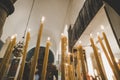 Prayer Orthodox candles. Rite of passage in the Church. Lighting candles in the church and praying Royalty Free Stock Photo