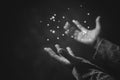 Prayer person hand in black background. Christian catholic woman are praying to god in dark at church. Girl believe and faith in