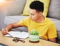 Prayer, reading and bible with man in living room for worship, spiritual and Christian faith. Hope, God and belief with Royalty Free Stock Photo