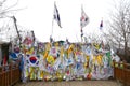 Prayer ribbons tied to the fence left by visitors