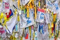 Prayer ribbons tied to the fence left by visitors wishing peace and unification