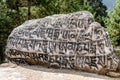 Prayer rock near the village of Phakding on the way to Everest Base Camp, Nepal Royalty Free Stock Photo