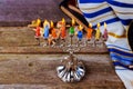 prayer shawl, jewish cap and nine candle menorah Royalty Free Stock Photo