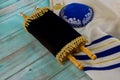 Prayer shawl kippa Jewish prayer religious symbol with torah scroll Royalty Free Stock Photo