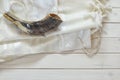 Prayer Shawl - Tallit, jewish religious symbol. Selective focus.