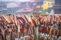 Prayer tags tied on the bridge in the Pilok mine village in kanchanaburi City Thailand.