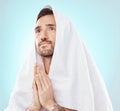 Prayer, thinking and worship with man and towel for hope, spiritual and Catholic faith. Respect, religion and Holy Royalty Free Stock Photo