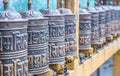 Prayer wheels in the buddhist temple Royalty Free Stock Photo