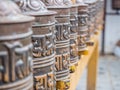 Prayer wheels in the buddhist temple Royalty Free Stock Photo