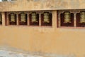 Prayer wheels of the Kenchosum Lhakhang temple Royalty Free Stock Photo