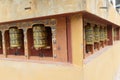 Prayer wheels of the Kenchosum Lhakhang temple Royalty Free Stock Photo