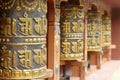 Prayer wheels of the Kenchosum Lhakhang temple Royalty Free Stock Photo