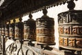 Prayer wheels made from metal at Swayambhunath Temple - Monkey Temple, Kathmandu, Nepal Royalty Free Stock Photo