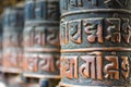 Prayer wheels at the Monkey temple Swayambhunath Stupa complex, Kathmandu, Nepal. Royalty Free Stock Photo