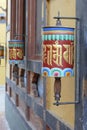 Prayer wheels repeating mantra Om mani padme um Royalty Free Stock Photo