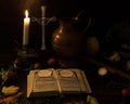 Prayer on wood table, candle and cross. The concept of waiting for Christmas. 11/22/2019. Montenegro. Royalty Free Stock Photo