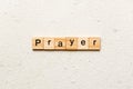 PRAYER word written on wood block. PRAYER text on cement table for your desing, concept Royalty Free Stock Photo