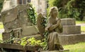 Praying angel with creeping ivy Royalty Free Stock Photo