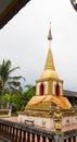 Praying angel statue beside the buddhist pagoda Royalty Free Stock Photo