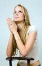 Praying blond girl. Royalty Free Stock Photo