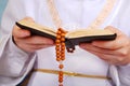 Praying boy going to the first holy communion