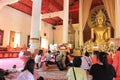 Praying at a buddist temple Royalty Free Stock Photo