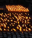 Praying candles burning in the dark at Boudhanath stupa, Kathmandu, Nepal