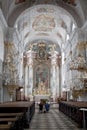 Praying in the cathedral of Klagenfurt, Austria