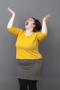Praying concept for excited overweight 20s woman Royalty Free Stock Photo
