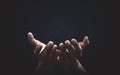 Praying hands with faith in religion and belief in God on blessing background. Power of hope or love and devotion Royalty Free Stock Photo
