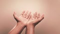 Praying hands with faith in religion and belief in God on calm background. Power of hope or love and devotion Royalty Free Stock Photo